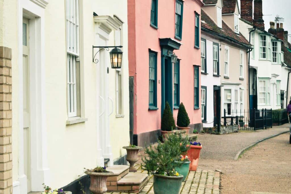 A row of pastel-coloured English houses
