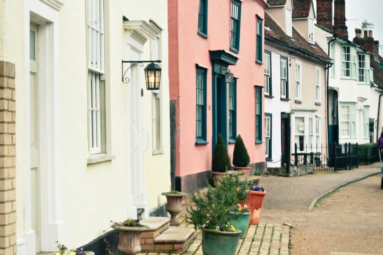 A row of pastel-coloured English houses