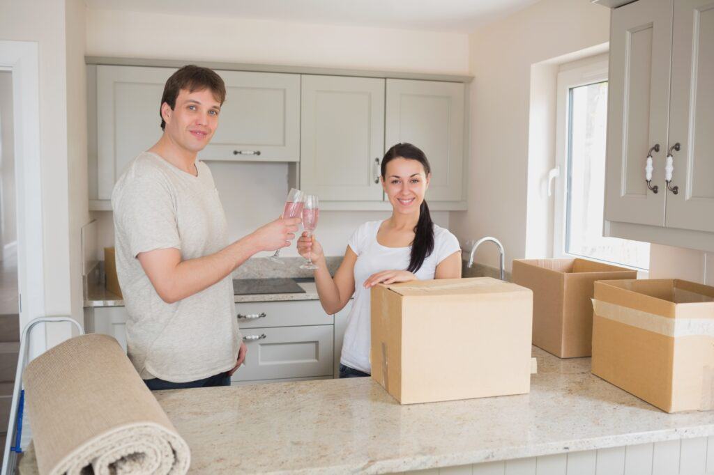 A couple celebrating their house relocation